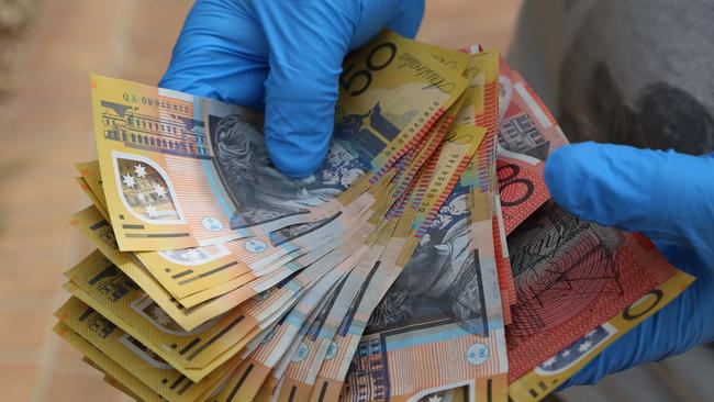 Detectives found about $23,000 in cash during a Croydon Hills house raid. Picture: Supplied.