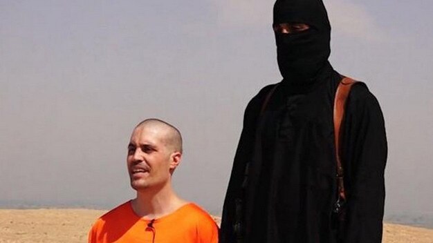 A still of American journalist James Foley about to be beheaded by an Islamic State fighter in Syria sent to the Executive Council of Australian Jewry.