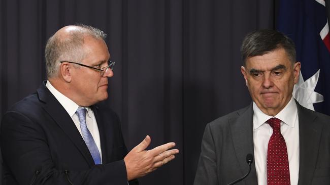 Australian Prime Minister Scott Morrison (left) and Australia's Chief Medical Officer Professor Brendan Murphy speak to the media on Thursday. Picture: AAP/Lukas Coch