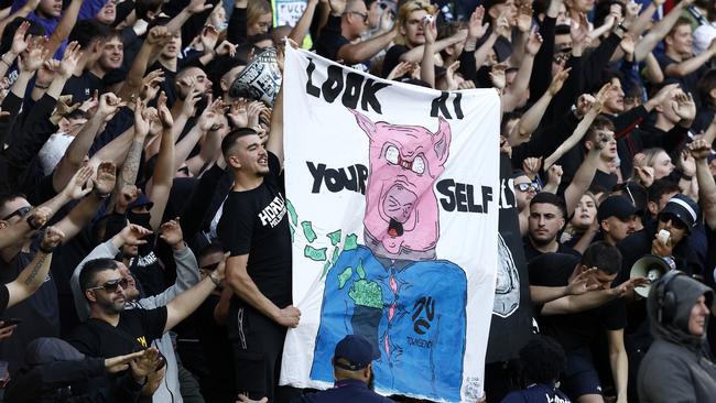 Fans show their disappointment with the APL before the match. Picture: Darrian Traynor/Getty Images