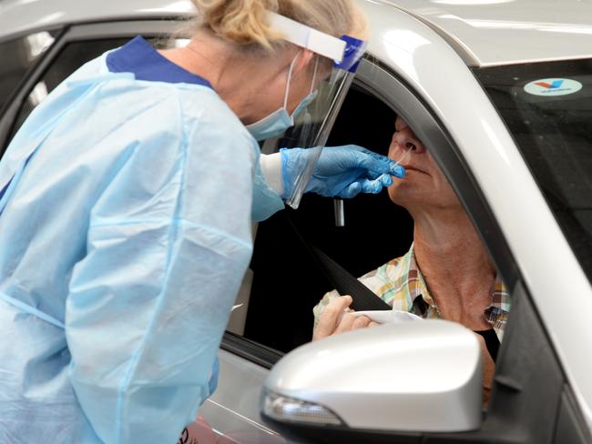 MELBOURNE, AUSTRALIA - NewsWire Photos JANUARY 08, 2021: People get tested for COVID at the Showgrounds testing site at Ascot Vale. Picture: NCA NewsWire / Andrew Henshaw