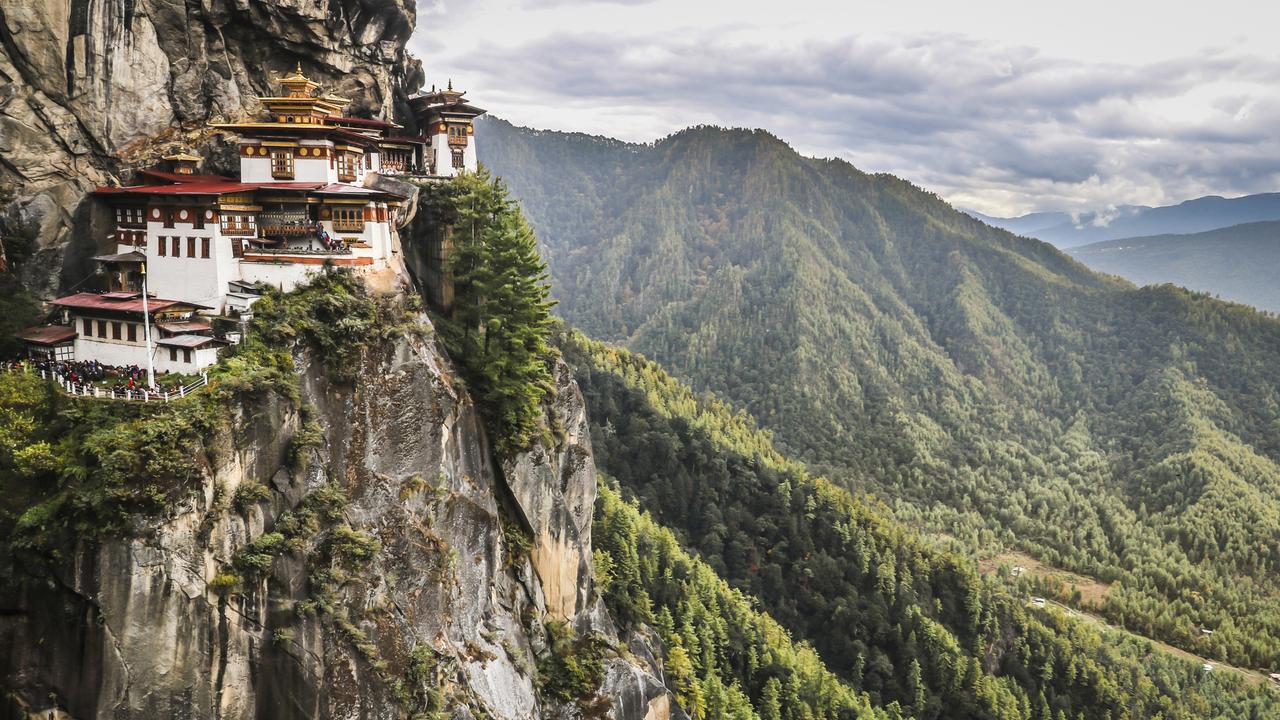 Taktsang Monastery On A Cliff High Above Paro Valley.