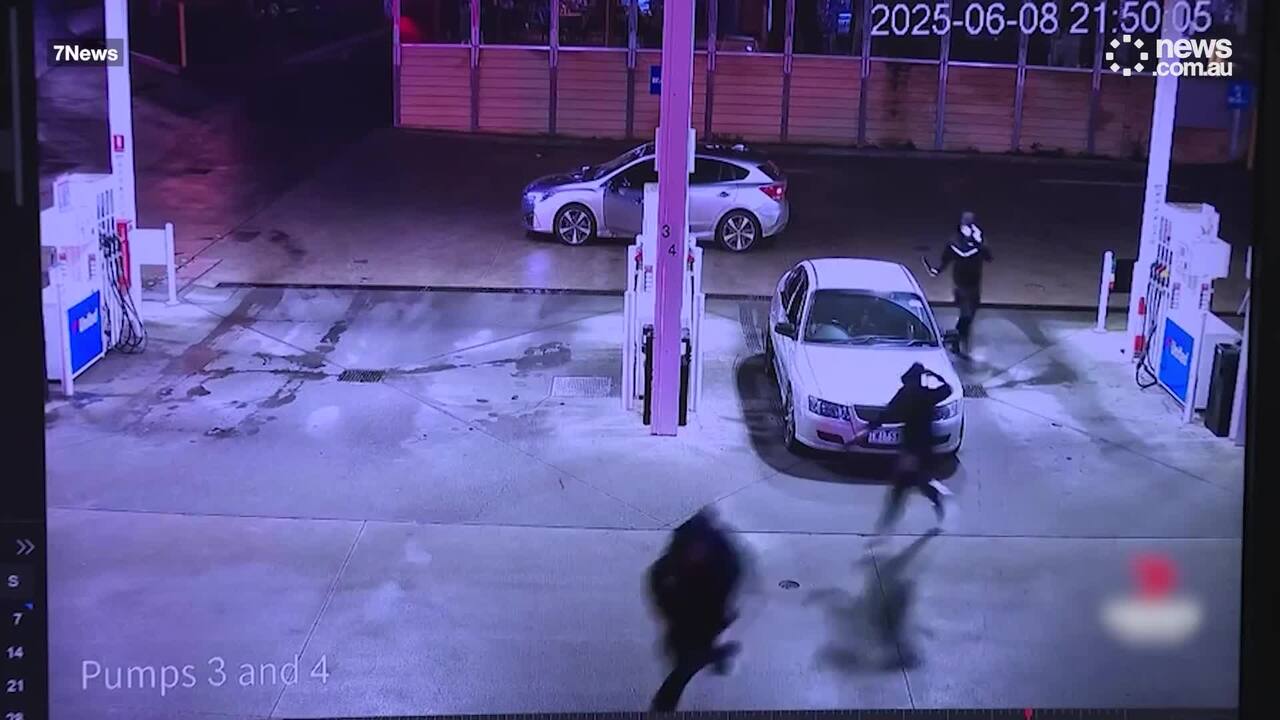 Moment teen stabbed and chased by two machete-wielding men