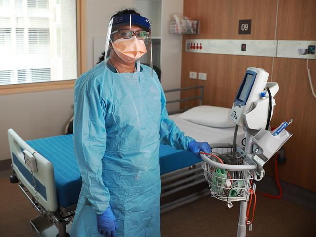 21/2/20: Dr Kavita Varshney who is an emergency doctor wearing personal protective equipment, mask, gloves, gown etc to illustrate coronavirus story at Westmead Hospital. John Feder/The Australian.