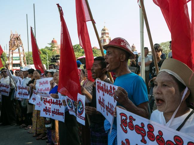 Myanmar protestors hold a rally in Yangon to protest against any reinstatement of a controversial Chinese-backed mega-dam during the final day of Xi Jinping’s visit. Picture: AFP