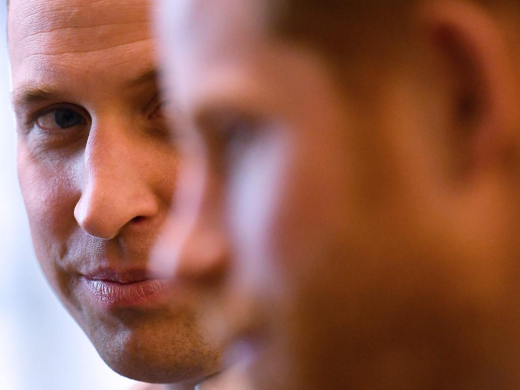 Britain's Prince Harry (R) and Britain's Prince William, Duke of Cambridge.