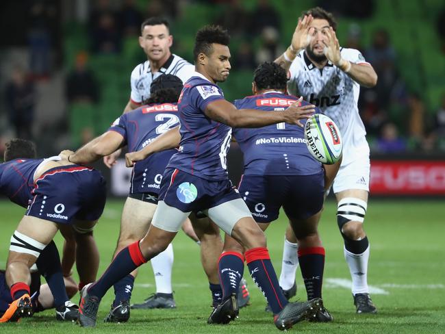 Rebels half Will Genia tries to clear the against the Crusaders. Picture: Getty Images