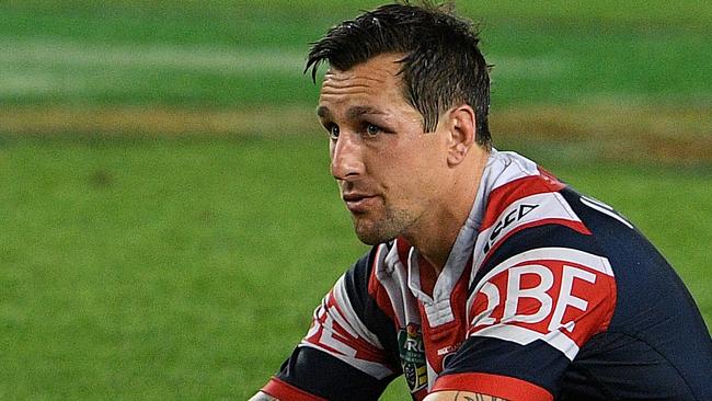 Mitchell Pearce reacts following his team's loss to the Cowboys in the NRL Preliminary Final between the Sydney Roosters and the North Queensland Cowboys at Allianz Stadium in Sydney, Saturday, September 23, 2017. (AAP Image/Dan Himbrechts) NO ARCHIVING, EDITORIAL USE ONLY