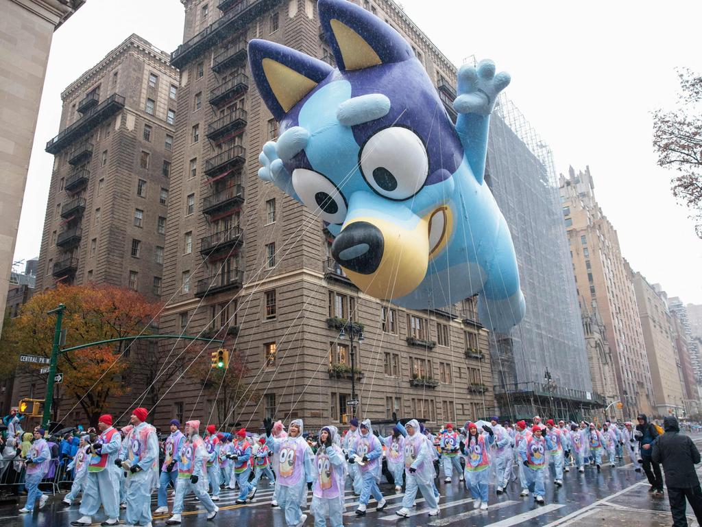 NEW YORK, NEW YORK - NOVEMBER 28: The Bluey balloon floats the Annual Thanksgiving Day Parade on November 28, 2024 in New York City. This is the 98th Macy's Thanksgiving Day Parade which was first held in 1924 and only paused from 1942 to 1944 during World War II.   Kena Betancur/Getty Images/AFP (Photo by KENA BETANCUR / GETTY IMAGES NORTH AMERICA / Getty Images via AFP)