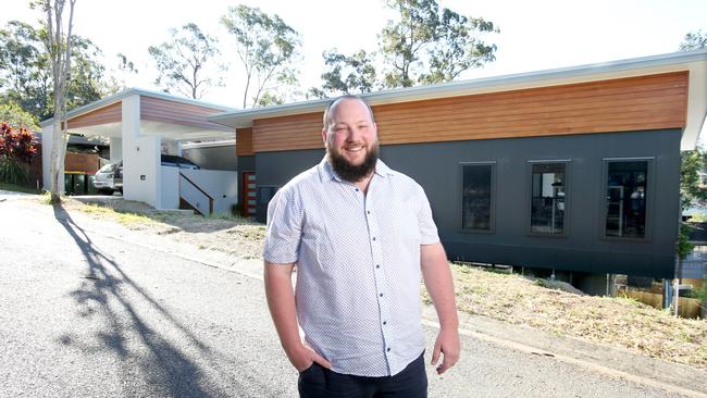 Grant Malcolm who has saved $1,200 a month in mortgage costs by refinancing and got $4,000 cashback from the bank. Photo Steve Pohlner