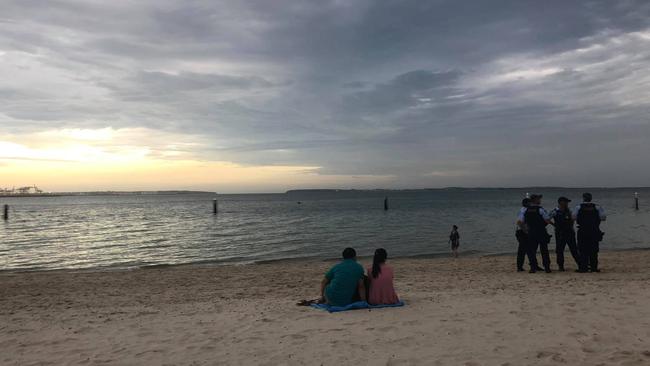 Police attended Lady Robinson Beach last night after swimmers reported seeing the shark in the netted area. Picture: Supplied by Tanya Kul