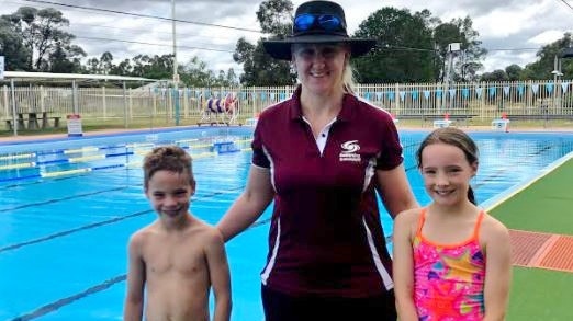 FURTURE STARS: Avid swimmers, Felicity and Xavier Wells with Jessica Schipper at the Tara Pool. Pic: Supplied