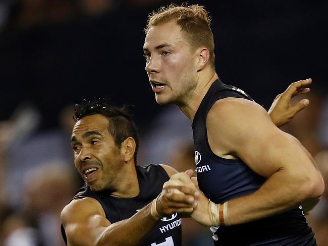 MELBOURNE, AUSTRALIA - APRIL 04: Eddie Betts (L) and Harry McKay of the Blues celebrate during the 2021 AFL Round 03 match between the Carlton Blues and the Fremantle Dockers at Marvel Stadium on April 04, 2021 in Melbourne, Australia. (Photo by Michael Willson/AFL Photos via Getty Images)