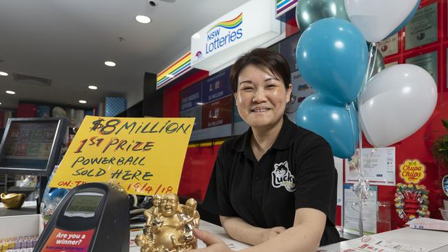 Gina Nguyen at Greenfield Newsagent sold a Lotto ticket that scored a whopping $8 million division one prize. Picture: AAP/Matthew Vasilescu