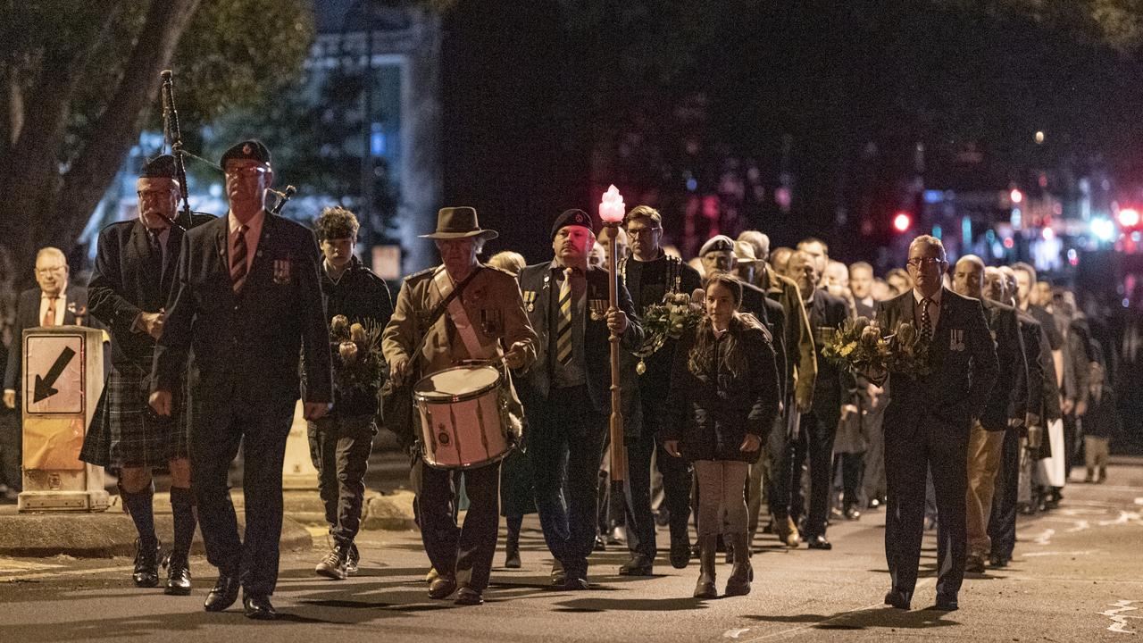 The march through the pre-dawn streets to Toowoomba's Anzac Day dawn service at the Mothers' Memorial, Thursday, April 25, 2024. Picture: Kevin Farmer