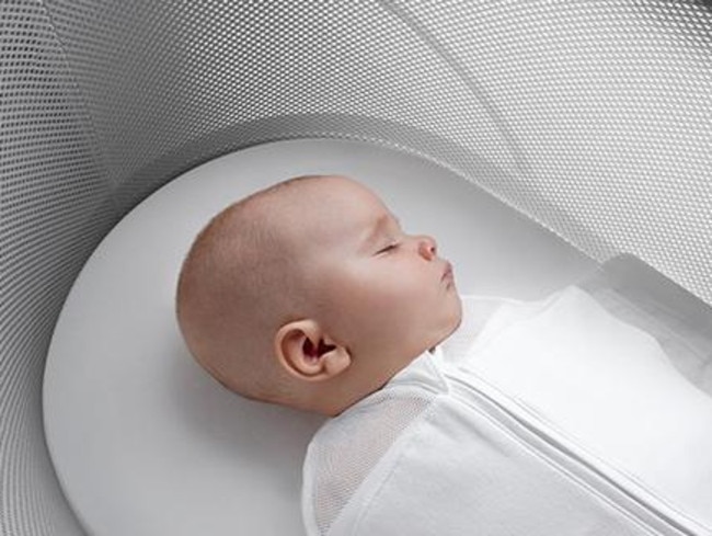 The Snoo Smart Sleeper detects when your baby is crying, and rocks he/she back to sleep. Picture: Happiest Baby.