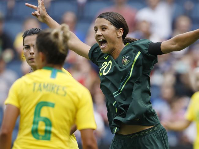 Australia's Sam Kerr (20) celebrates after her team scored against Brazil in the first half of a Tournament of Nations soccer match in Kansas City, Kan., Thursday, July 26, 2018. (AP Photo/Colin E. Braley)