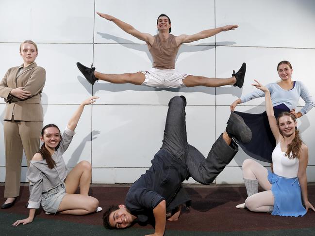 Year 12 students from McDonald College in Strathfield rehearse for their roles in the musical Fame. (From left) Emily Skipper, Tamsyn Willey, Sam Austin (jumping), Justin Sacco, Jasmine Argyropoulos and Grace Jones. Picture: Toby Zerna