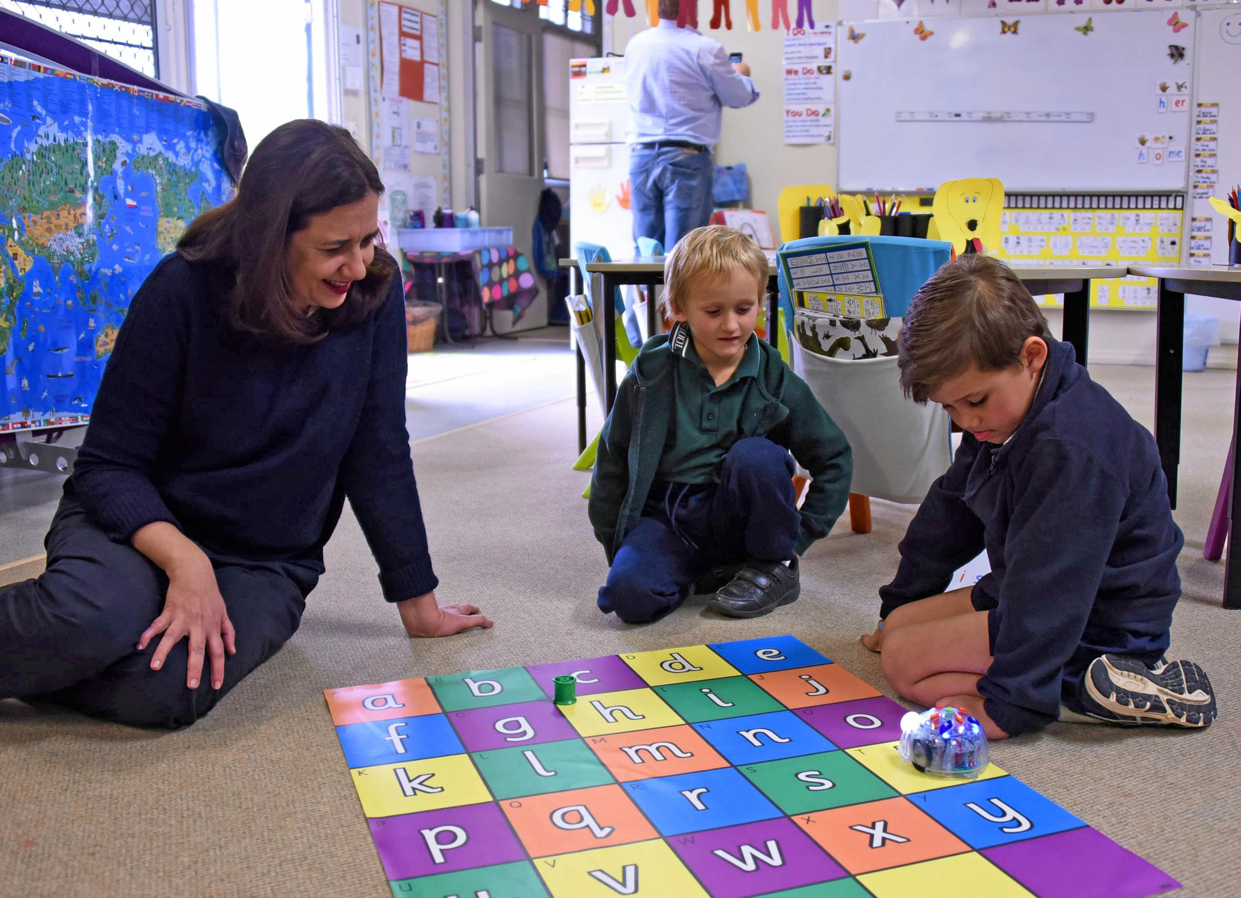 Annastacia plays a STEM game with students Karson Law and Sonny Smith. Picture: Alexia Austin