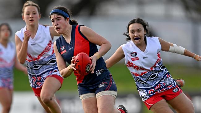 NFL: Diamond Creek Women’s Chiara Nardo on the run. Picture: Andy Brownbill