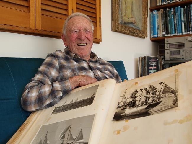 27/06/2024. Gordon Ingate, Australia's oldest Olympian at 98 years old, pictured with his scrap book at his home in Cammeray, on Sydney's north shore. Gordon competed in the 1972 Summer Olympics in Munich, he still sails and was awarded his most recent trophy this year. Britta Campion / The Australian