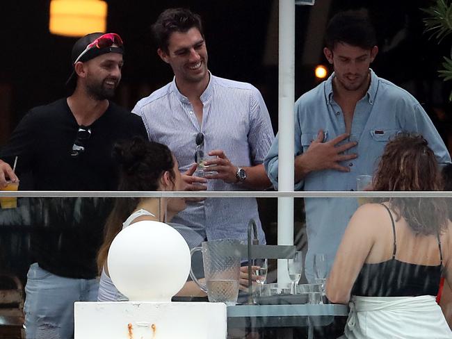 Nathan Lyon, Pat Cummins and Mitchell Marsh chat with fans during their Ashes victory celebrations. Picture: Dimex