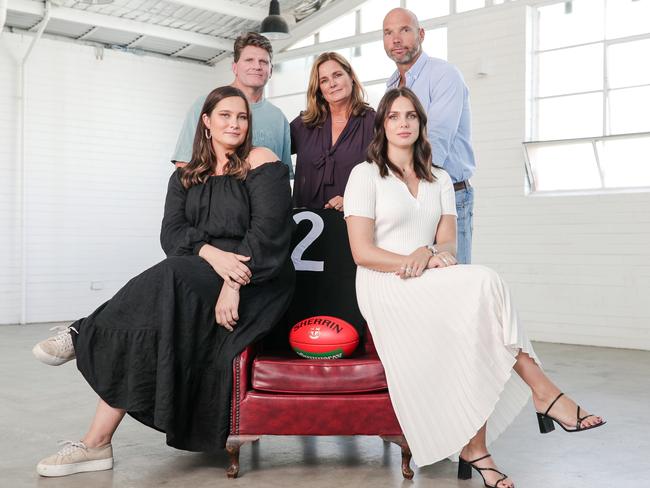 Danny Frawley’s wife Anita (back, centre) with St Kilda legends Robert Harvey and Stewart Loewe and daughters Chelsea (left) and Danielle (right). Picture: Corey Scicluna