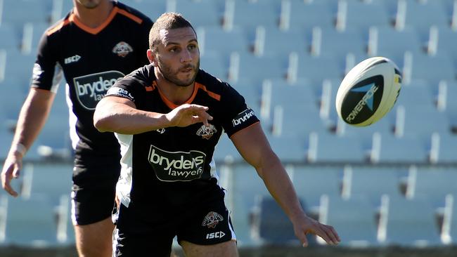 Wests Tigers Media Call held at Campbelltown Sports Stadium at Leumeah. Robbie Farah passes from dummy half during training