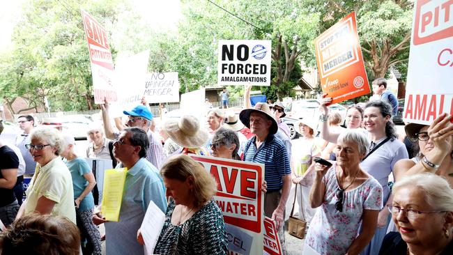 Anti-merger protesters in front of the former office of outgoing North Shore MP Jillian Skinner on February 5. Picture: Brianne Makin