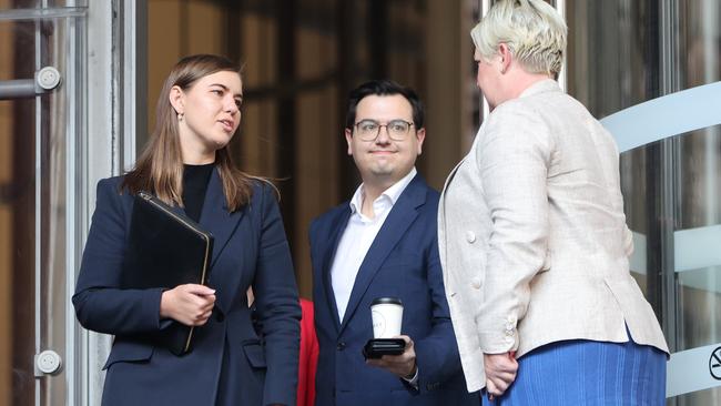 Ms Higgins leaves the Commonwealth Parliamentary Offices in Sydney, in 2021, with her partner David Sharaz. Picture: NCA NewsWire / Damian Shaw