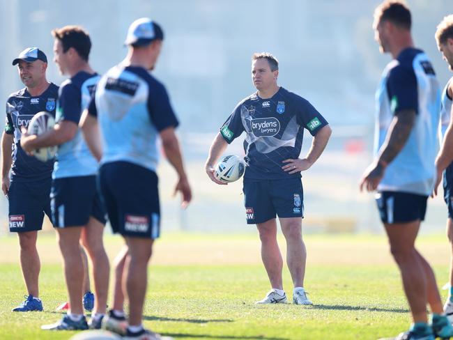 Coach Luke Phillips runs a drill. Picture: Brett Costello