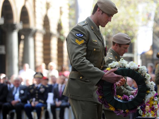 Ben Roberts-Smith VC lays a wreath during the launch of Legacy Week at the Sydney Cenotaph in 2011. Picture: Dean Lewins