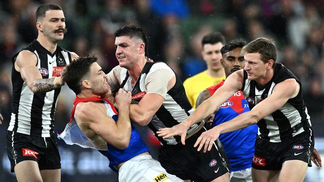 Jack Viney and Brayden Maynard tangle after the incident. Picture: Quinn Rooney/Getty Images.