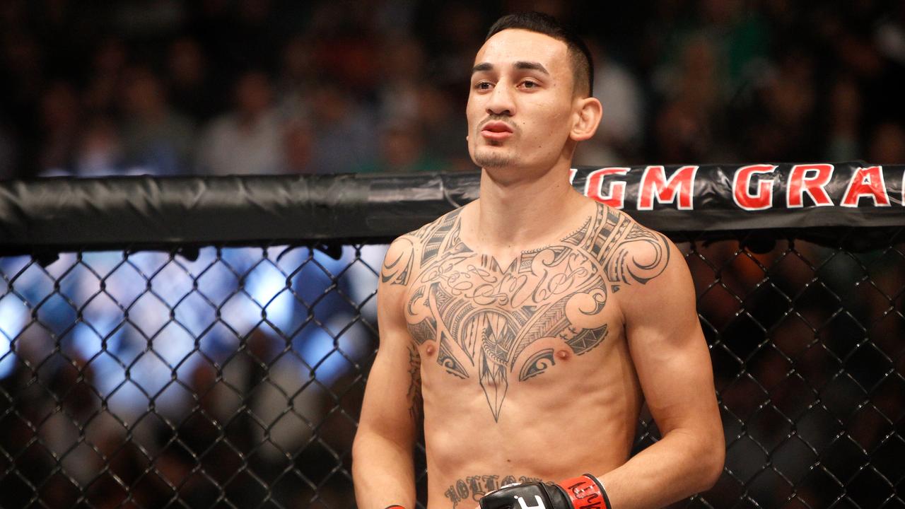 UFC 226: Featherweight champion Max Holloway drops out because of  concussion-like symptoms - The Washington Post