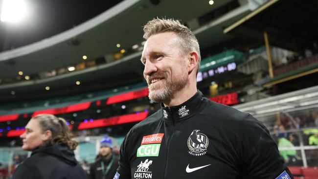 SYDNEY, AUSTRALIA – JUNE 14: Magpies head coach Nathan Buckley celebrates victory after coaching his final match for the Magpies during the round 13 AFL match between the Melbourne Demons and the Collingwood Magpies at Sydney Cricket Ground on June 14, 2021 in Sydney, Australia. (Photo by Matt King/Getty Images)