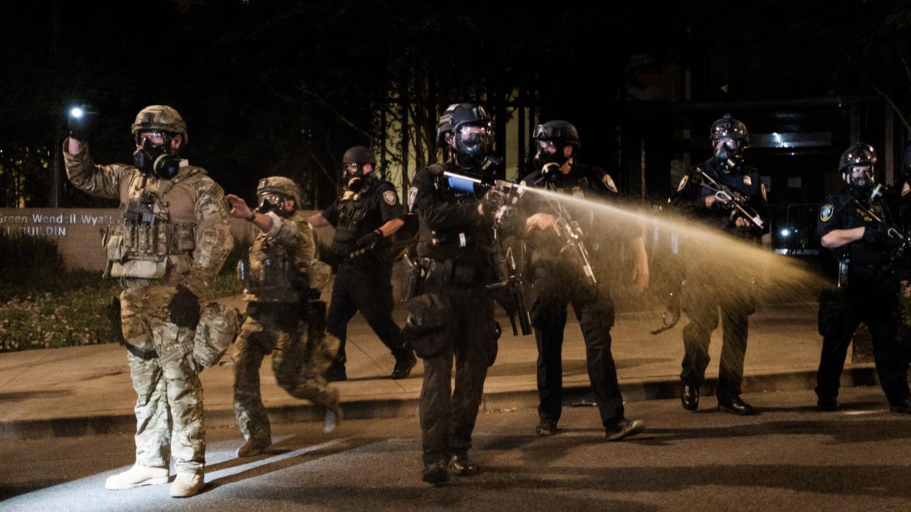 Federal officers use tear gas and other crowd dispersal munitions on protesters during weekend rallies. Picture: Mason Trinca/Getty Images/AFP