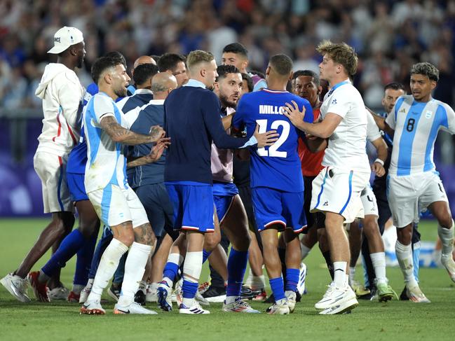 BORDEAUX, FRANCE - AUGUST 02: Nicolas Otamendi #16 of Team Argentina clashes with Team France players after the Men's Quarterfinal match between France and Argentina during the Olympic Games Paris 2024 at Nouveau Stade de Bordeaux on August 02, 2024 in Bordeaux, France. (Photo by Juan Manuel Serrano Arce/Getty Images)