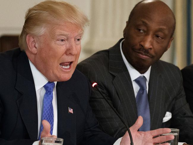 FILE - In this Thursday, Feb. 23, 2017, file photo, President Donald Trump, left, speaks during a meeting with manufacturing executives at the White House in Washington, including Merck CEO Kenneth Frazier, center, and Ford CEO Mark Fields. Frazier is resigning from the Presidentâ€™s American Manufacturing Council citing "a responsibility to take a stand against intolerance and extremism." Frazier's resignation comes shortly after a violent confrontation between white supremacists and protesters in Charlottesville, Va. Trump is being criticized for not explicitly condemning the white nationalists who marched in Charlottesville. (AP Photo/Evan Vucci, File)