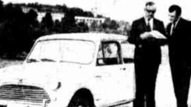 Keren's white Mini Minor - left is Inspector Reg Kennedy who led the case. Picture: The Canberra Times.