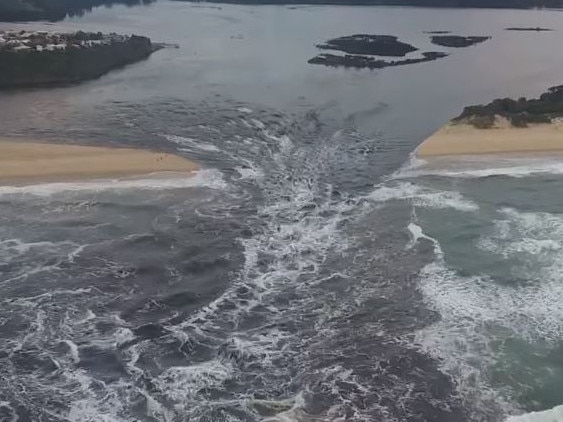 Lake Tyers broke into the ocean on Monday for the first time in five years. Picture: Facebook/Chris Rykers