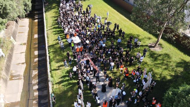 Maronite worshippers gather outside beyond the OLOL cathedral to begin Good Friday last year. Picture: Facebook