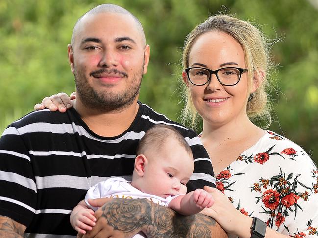 Baby Rylee, held by dad Logan Gardner, was having up to 150 seizures a day but has been seizure free for the last month after doctors changed her formula to Keto. Mum Aime Rottsey could not be happier. PICTURE: MATT TAYLOR.