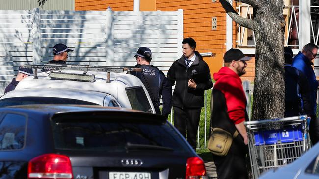 Police investigate the murder at Merrylands. Picture: Gaye Gerard