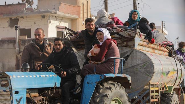 Displaced Syrians flee confrontation areas in the Hama region. Picture: AFP