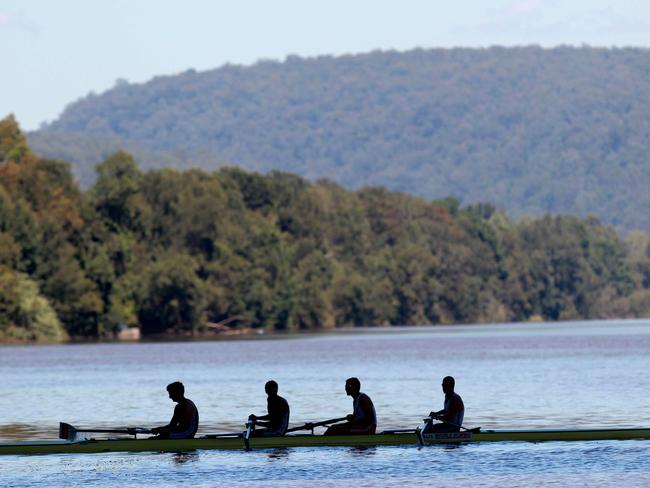 Rowers training on the Nepean River.