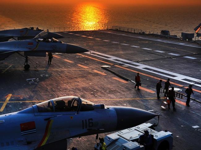 Chinese F-15 “Flying Shark” fighters on the deck of the aircraft carrier Liaoning. Picture: Supplied