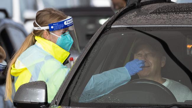 Healthcare workers working at the drive-through COVID-19 test centre at Bondi Beach, Sydney. Picture: NCA NewsWire / James Gourley