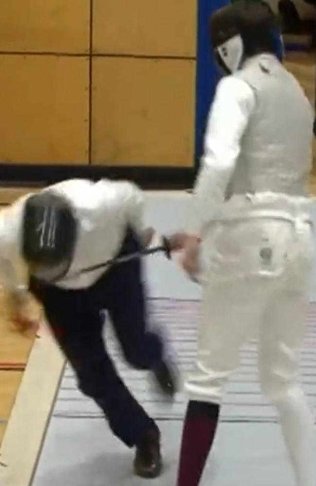 International Olympic Committee president Thomas Bach stumbles during a fencing demonstration in Brisbane on Saturday afternoon. Picture: 7 News Brisbane