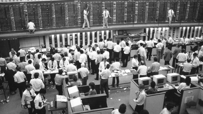 The market’s 21pc monthly loss is the worst since October 1987. Pictured here is the floor for the Melbourne Stock Exchange during that drop.