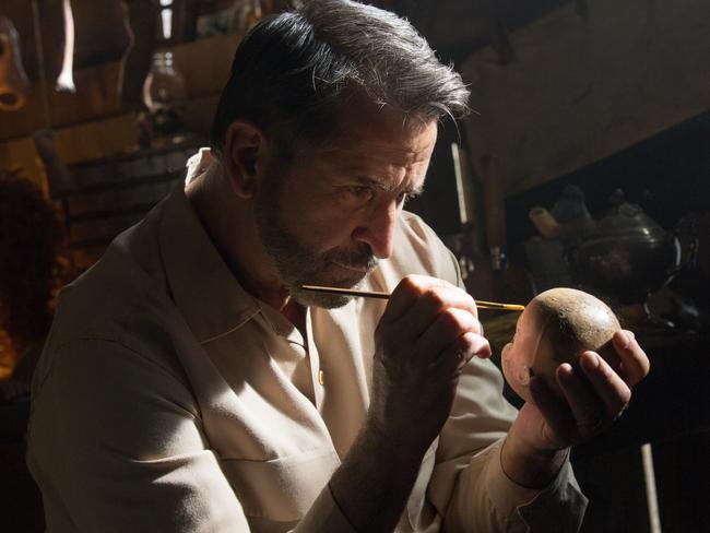 Anthony LaPaglia lovingly tends to his “baby” in horror movie Annabelle: Creation. Picture: Warner Bros